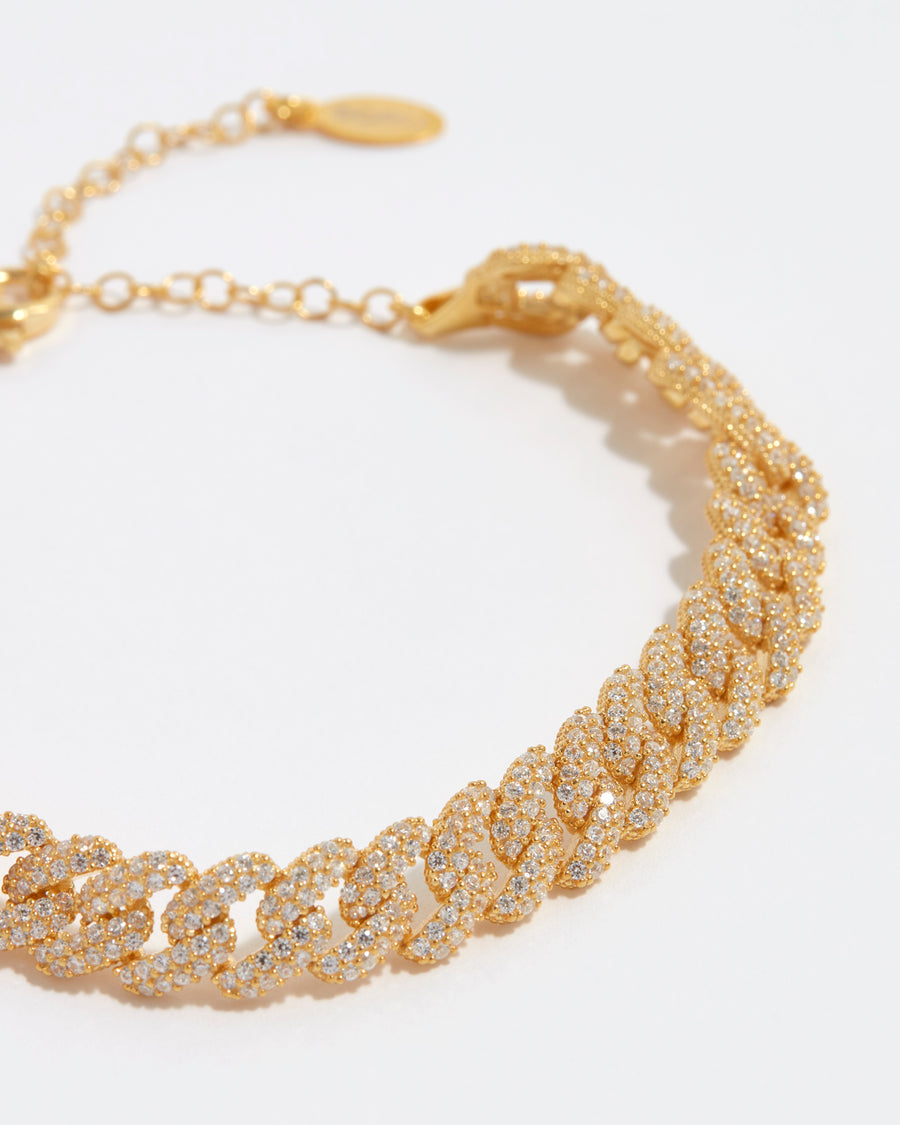 image shows close up of gold plated silver crystal chain link cuban bracelet
