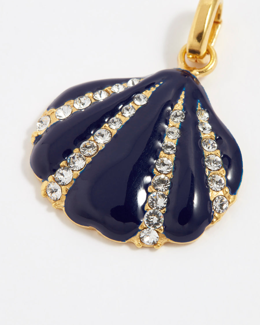 product shot of navy blue enamel and crystal encrusted shell shaped charm close up