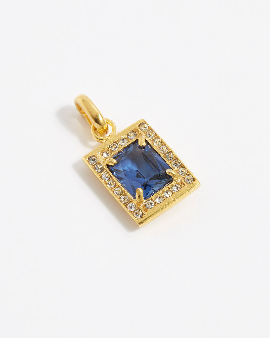 product shot of blue crystal square charm surrounded by clear crystals