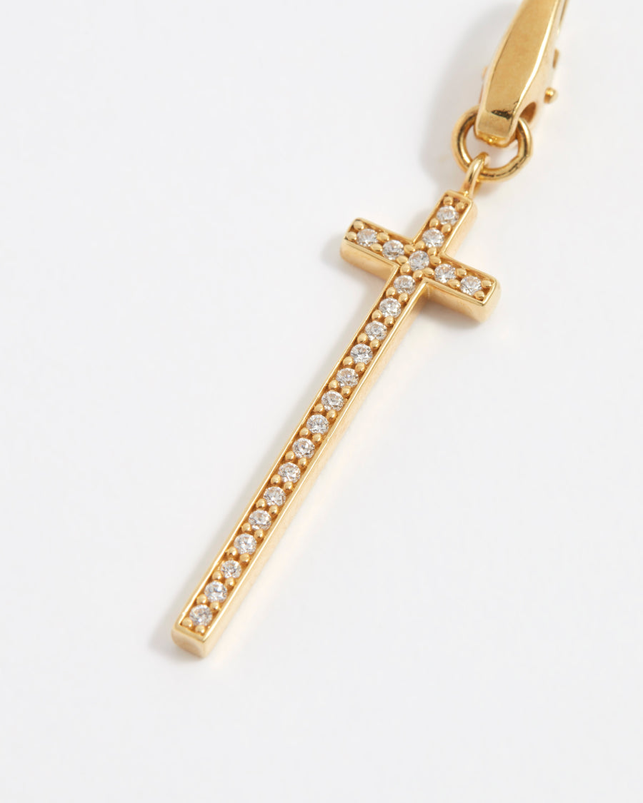 product shot of long line cross detachable charm embellished with crystals close up