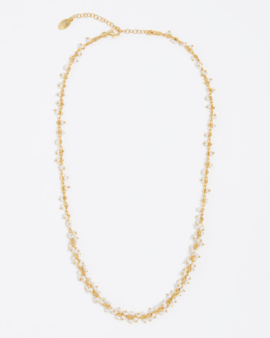 gold necklace with pearl intertwined