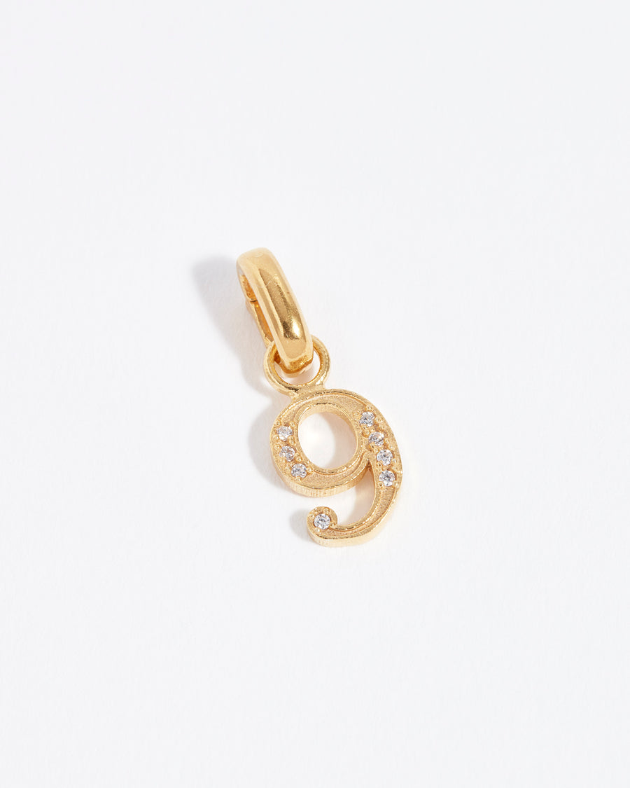 number 9 gold and crystal charm 