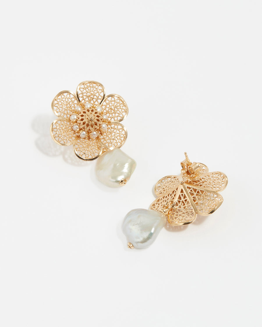soru large flower stud earrings with a single baroque pearl hanging made in 24ct gold plated silver