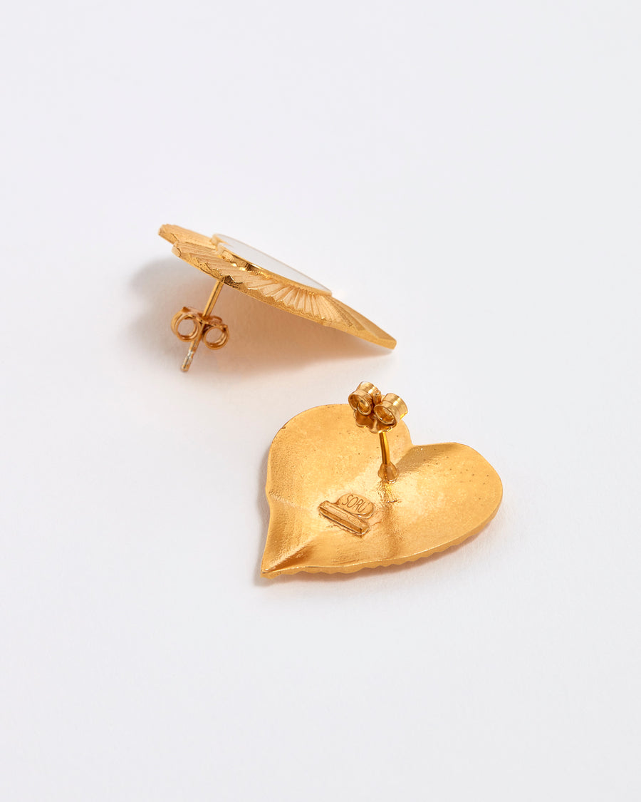  soru jewellery gold concertina heart shaped studs with white enamel centre. Back and side view 