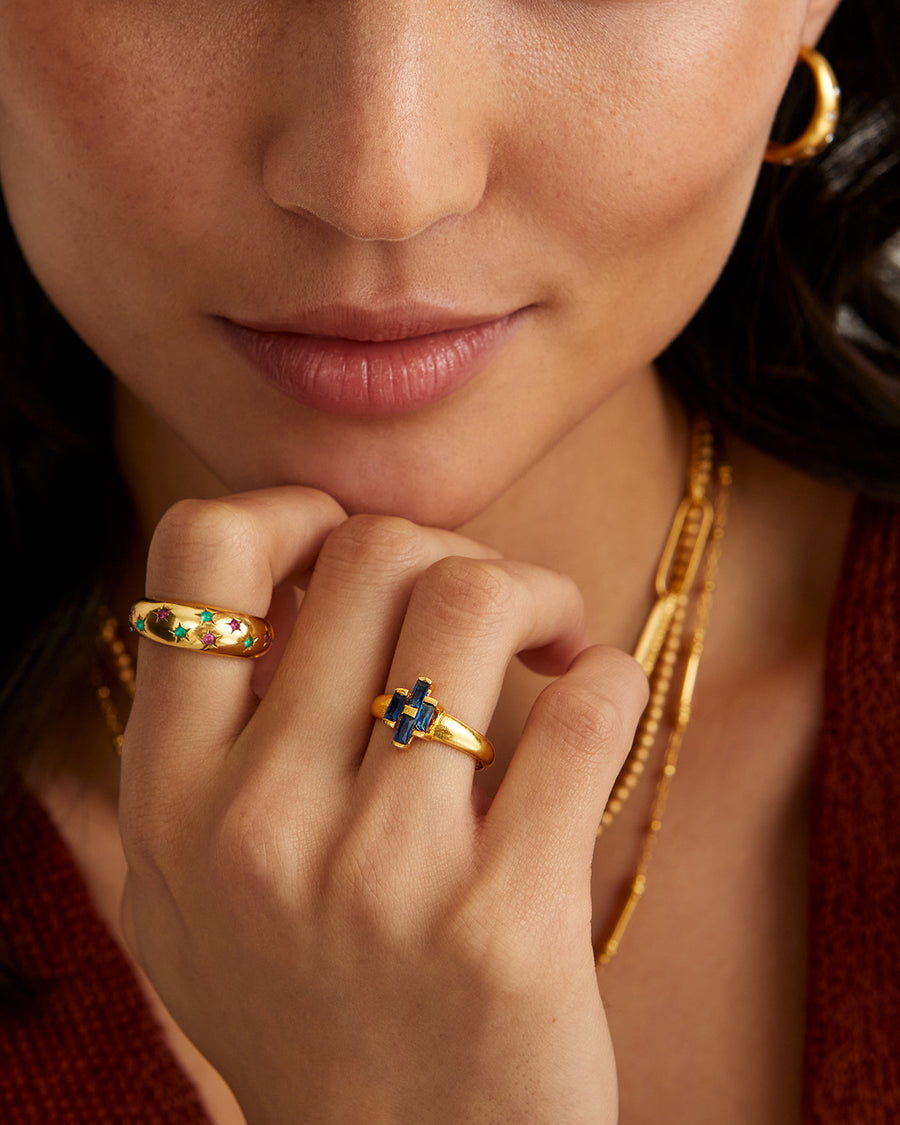 Soru Jewellery model shot of gold and coloured crystal band rings 