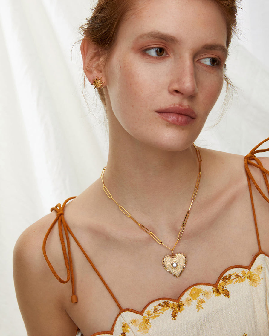 Soru Jewellery Textured gold star bust stud earrings