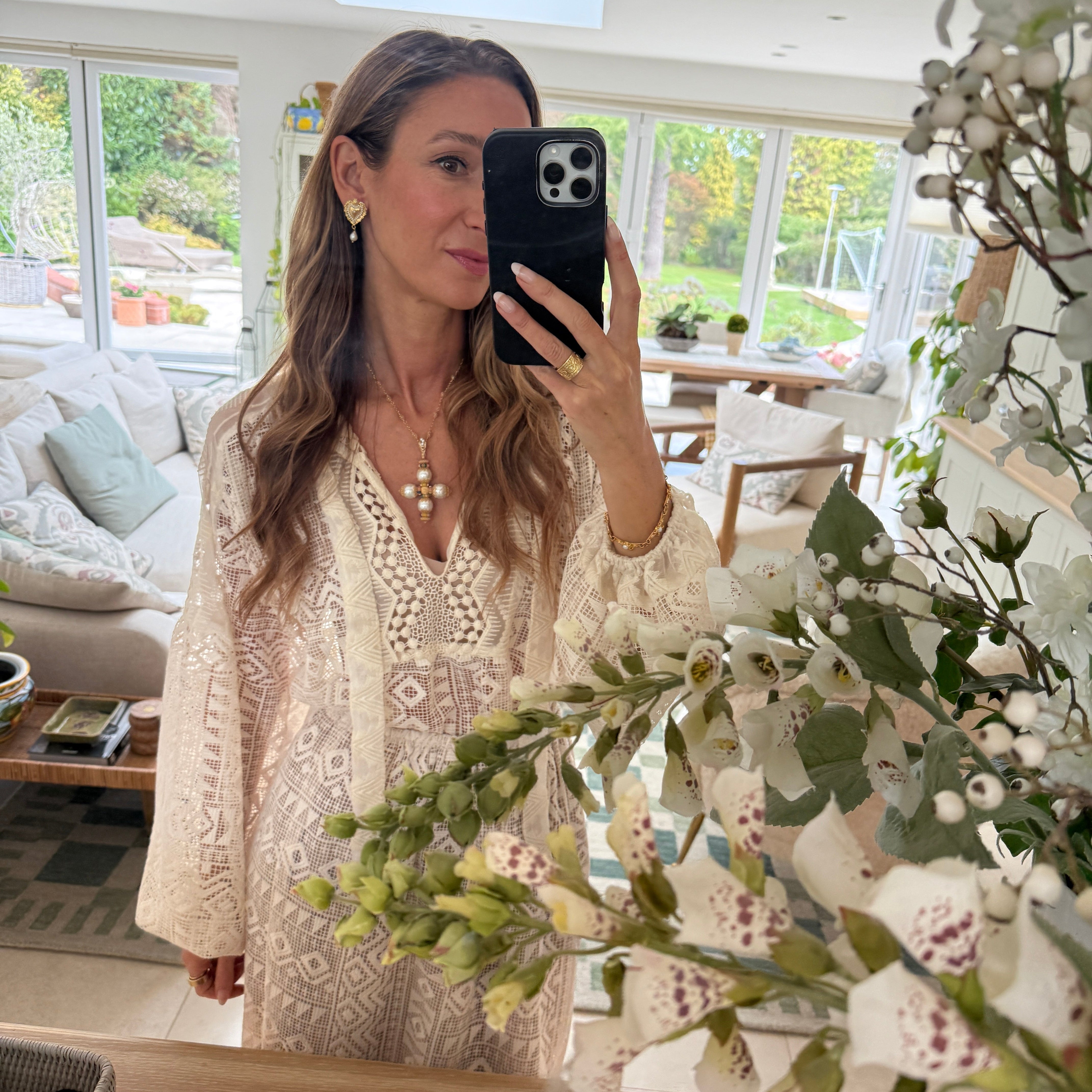 Francesca Kelly, founder of Soru Jewellery wearing Cimelio Cross Pendant 