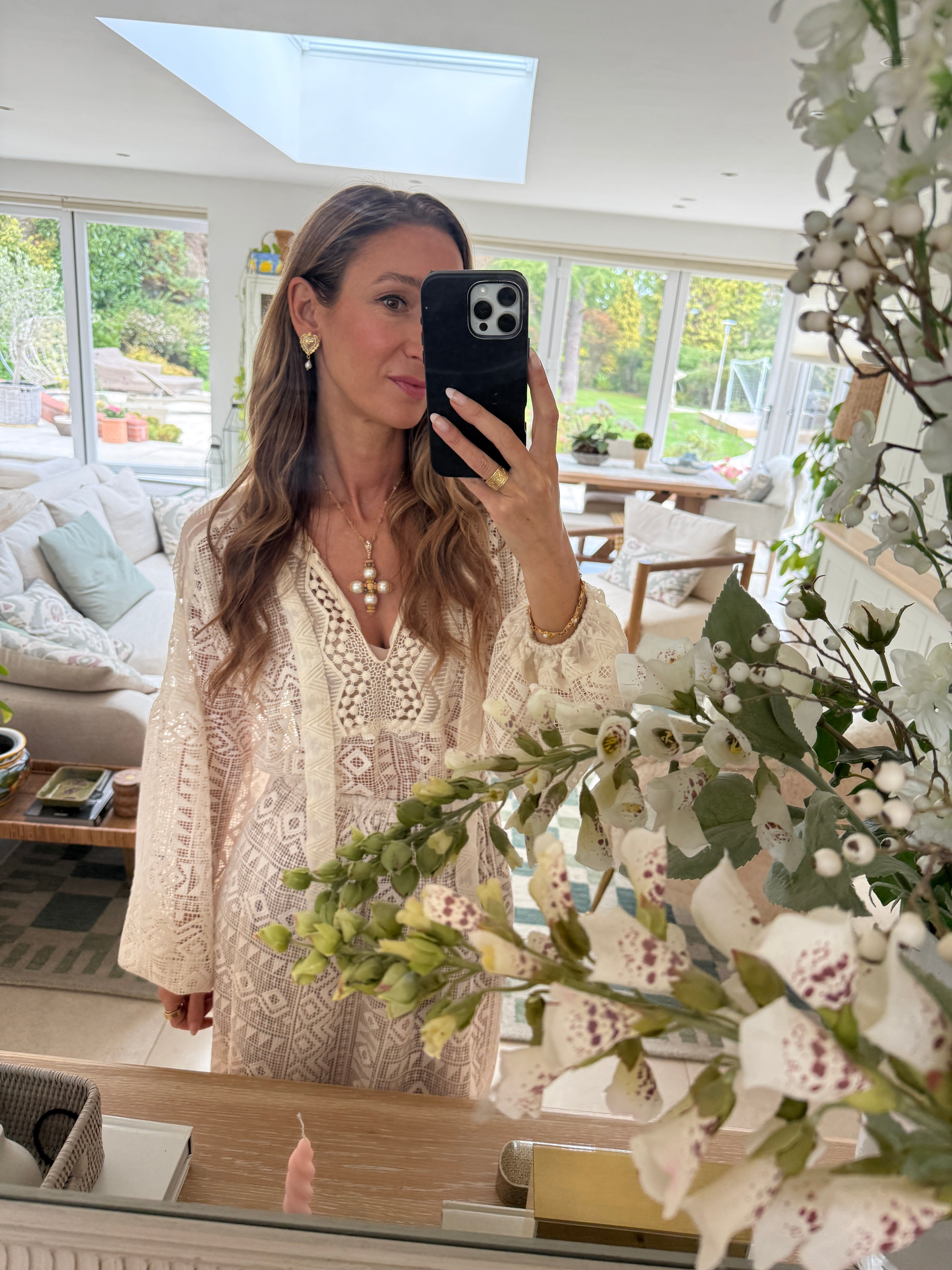 Francesca Kelly, founder of Soru Jewellery wearing Cimelio Cross Pendant 