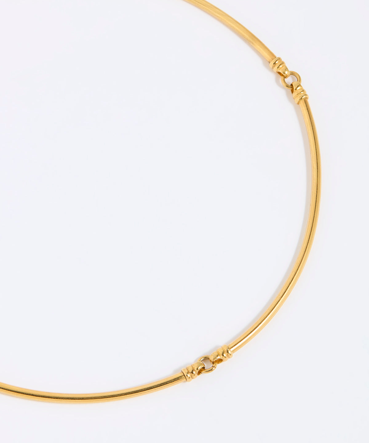 Gold necklace on a white background