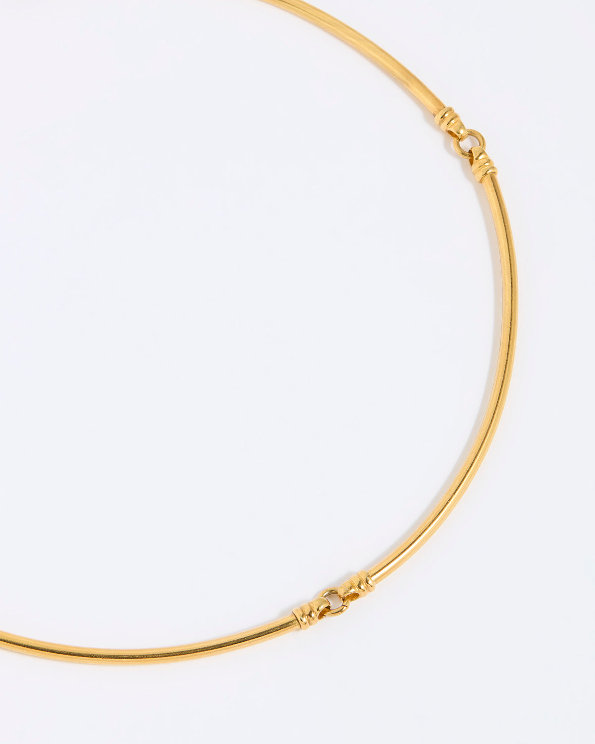 Gold necklace on a white background