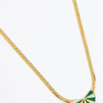 Gold necklace with a green and white fan shaped pendant on a white background