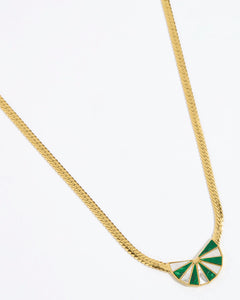 Gold necklace with a green and white fan shaped pendant on a white background