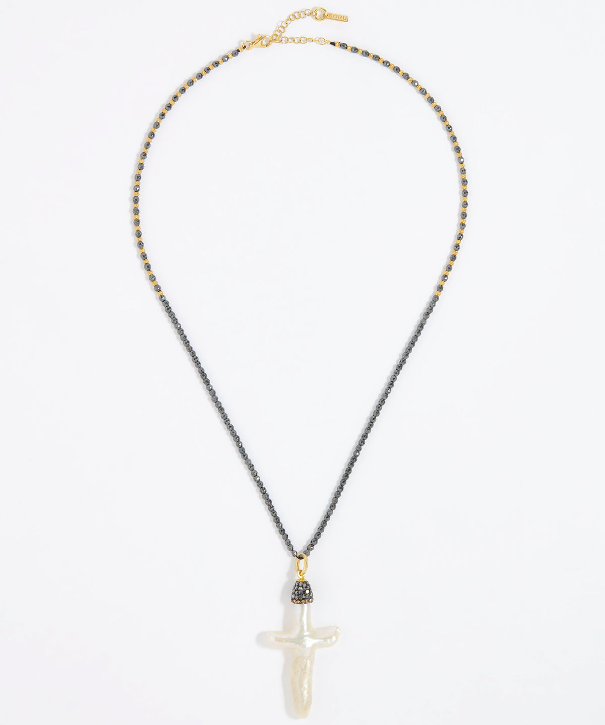 Pewter coloured beaded necklace with a white Baroque Pearl Cross pendant on a white background