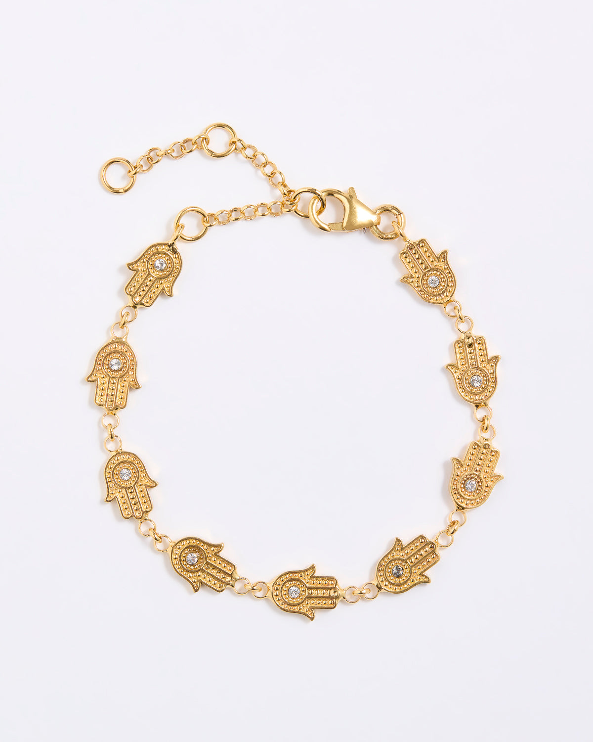 product shot on white background of a hamsa hand gold bracelet