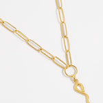 product shot of yellow gold plated snake charm on the chain