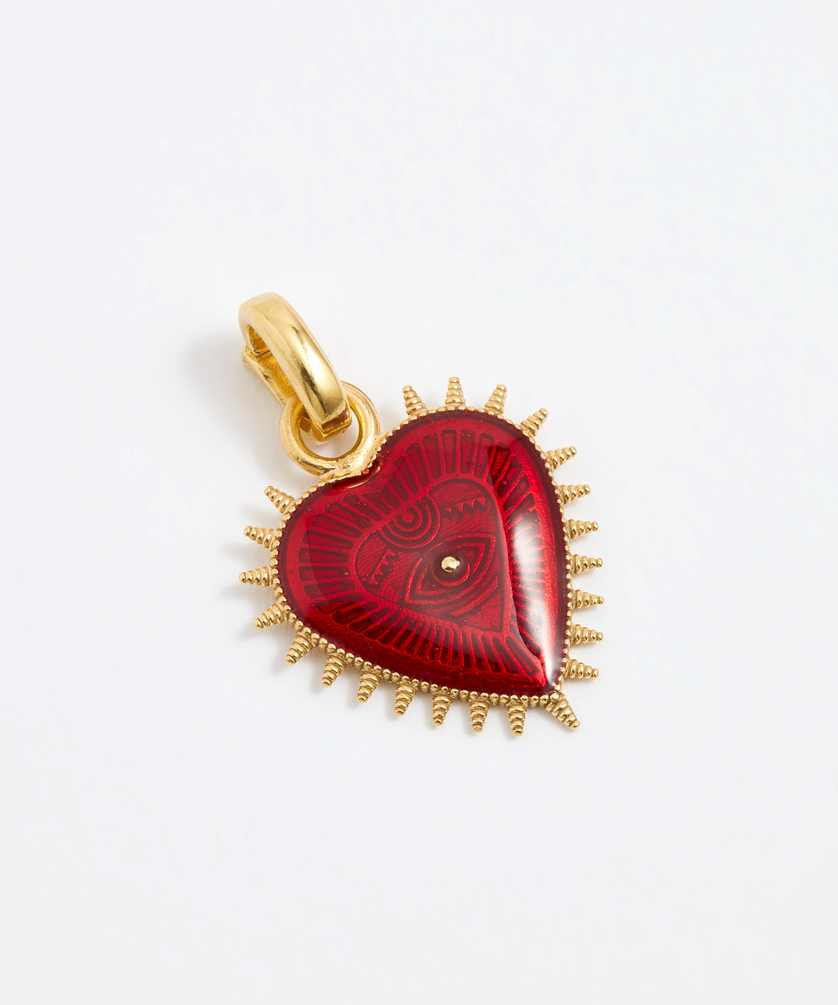 Product shot of a heart-shaped pendant featuring a deep, glossy red patterned enamel centre. The heart is surrounded by a border of gold spikes that extend outward from the edges.