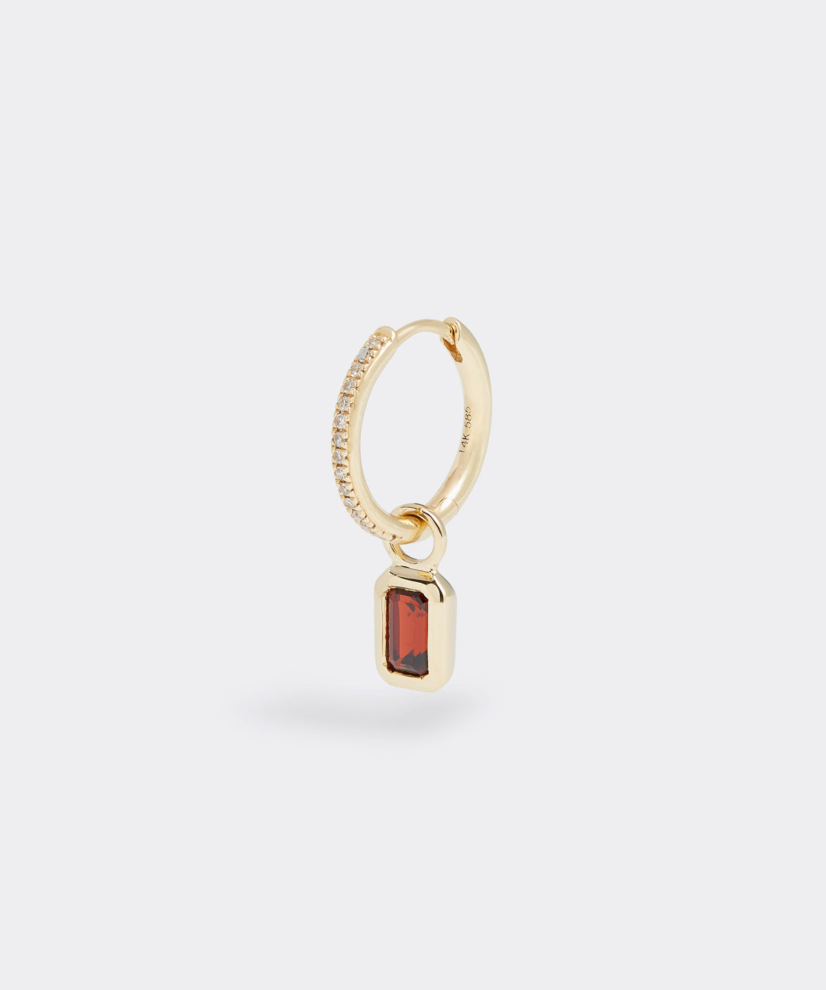 soru jewellery ruby birthstone charm hanging from diamond hoop earring, close up product shot 