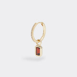 soru jewellery ruby birthstone charm hanging from diamond hoop earring, close up product shot 
