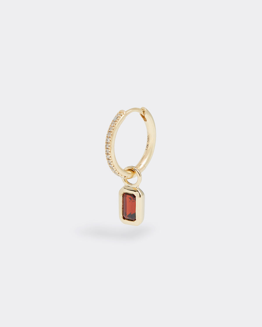 soru jewellery ruby birthstone charm hanging from diamond hoop earring, close up product shot 