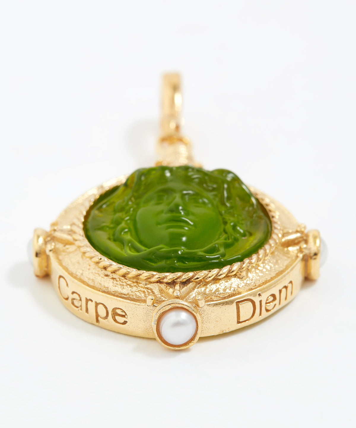 Gold pendant with green stone and pearl on a white background