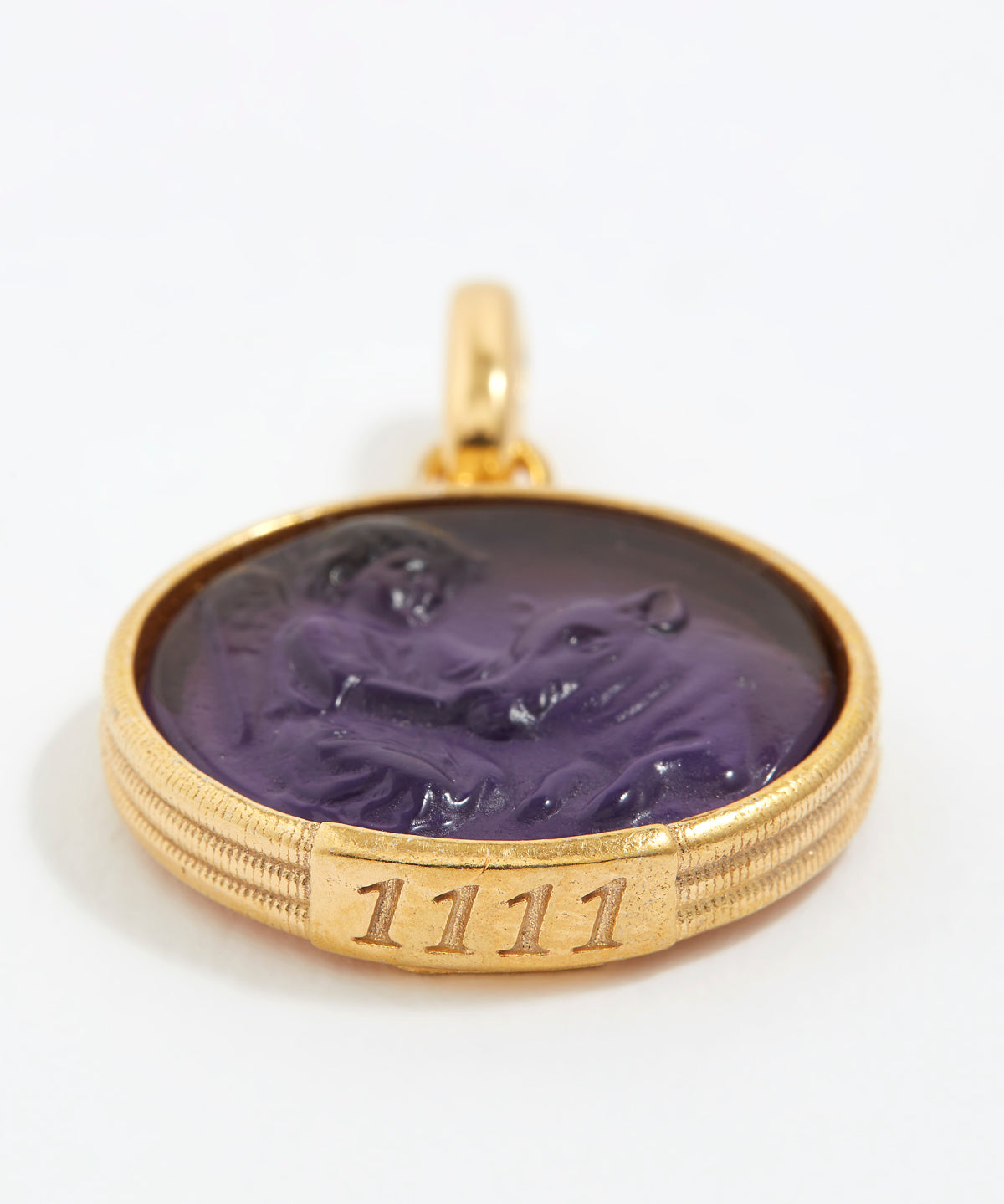 Gold pendant with purple stone and angel numbers 1111 engraving on a white background