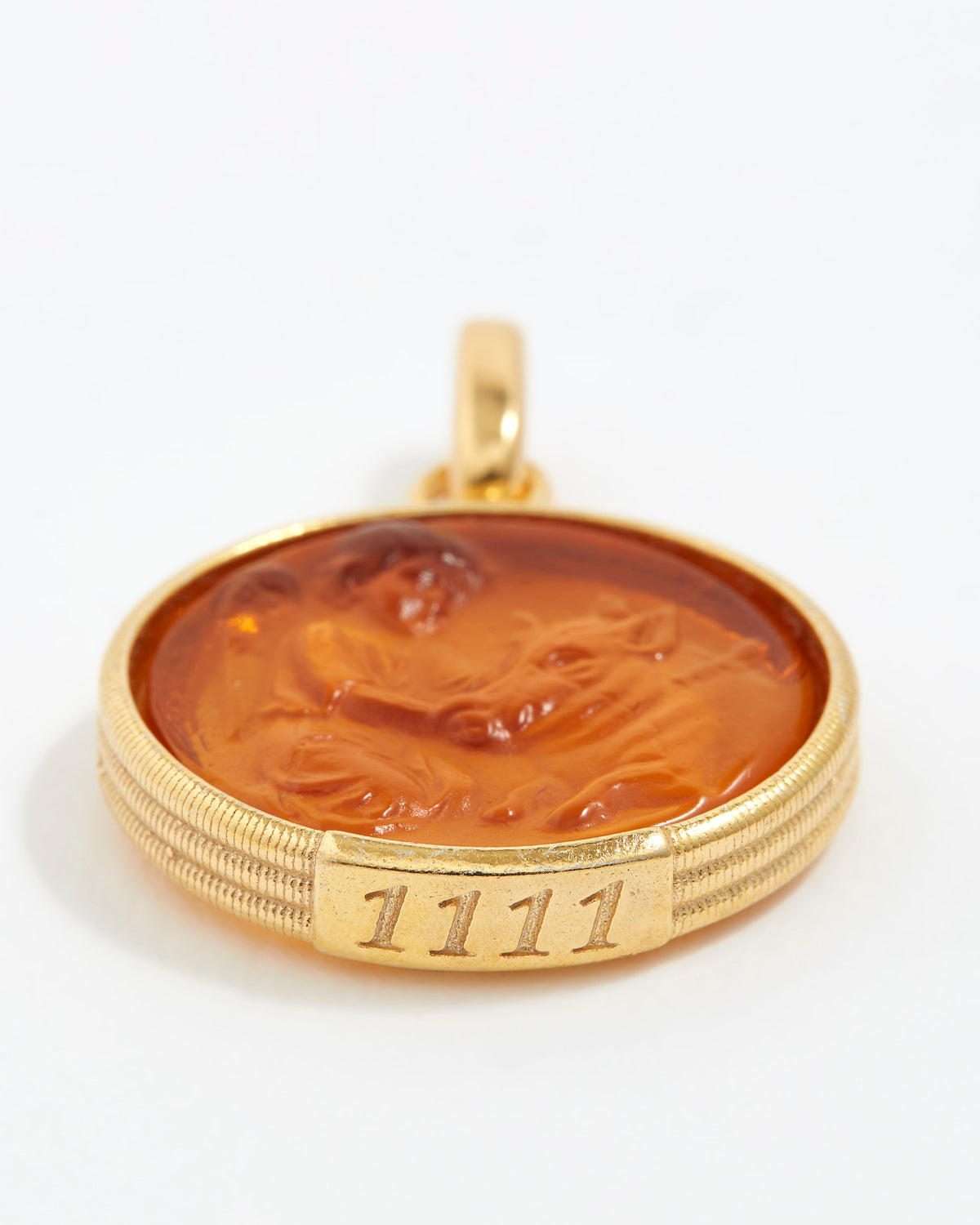 Gold pendant with a brown central design and angel number '1111' engraving on a white background