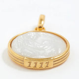 Gold pendant with a white stone and engraved angel numbers '1111' on a white background