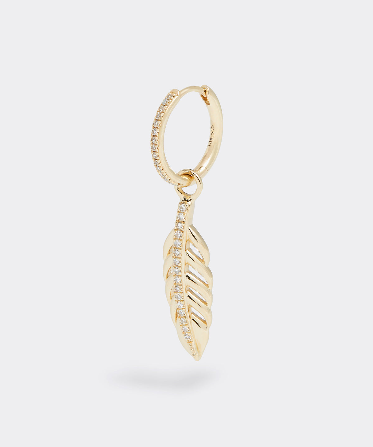 14ct gold & diamond charm, feather shape with diamonds down the centre, interchangeable charm to be used on necklaces and earrings, product shot on hoop earring