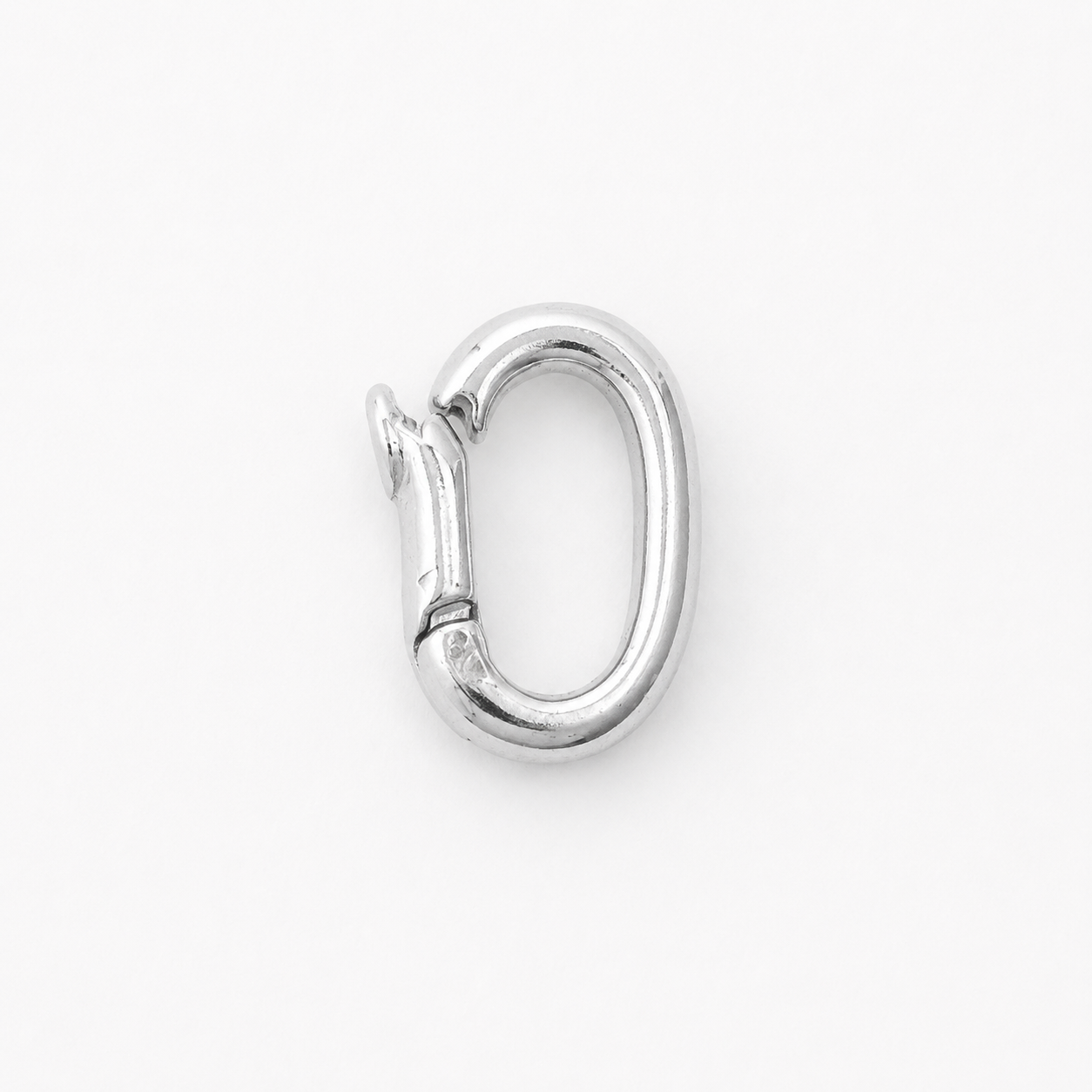 Silver charm connector on a white background