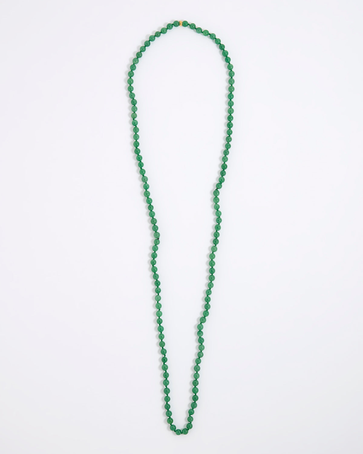 A green agate beaded necklace made of small, round, polished beads with a tiny gold spacer accent, displayed on a white background.
