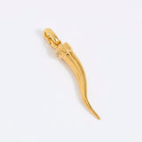 Gold cornicello charm pendant on a white background