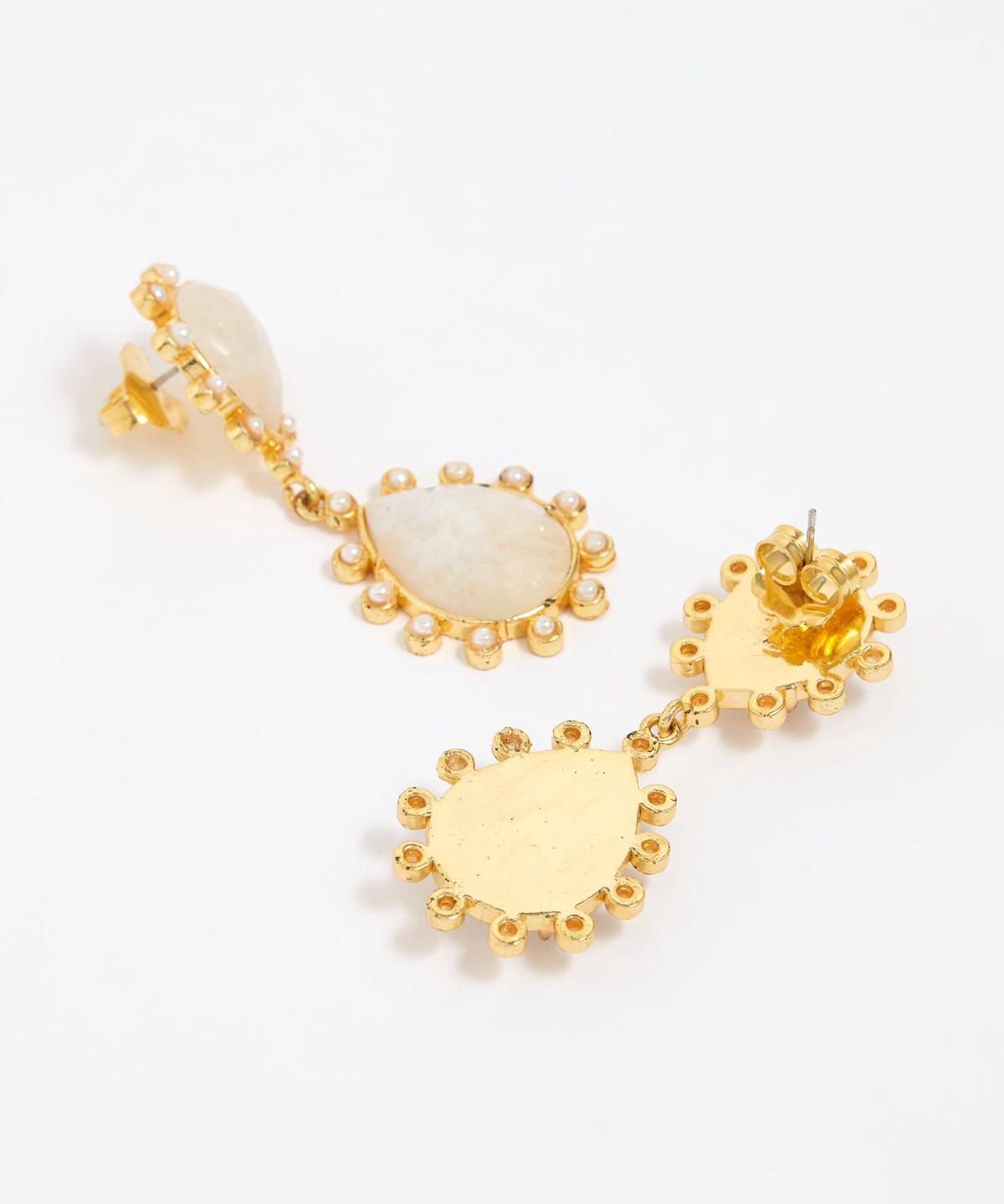 Close-up of side and reverse product shot  of gold earrings with teardrop shaped moonstones and small pearls on  white background
