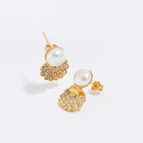 product shot of pearl stud earrings with crystal encrusted shell 