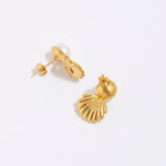 product shot of pearl stud earrings with crystal encrusted shell side view