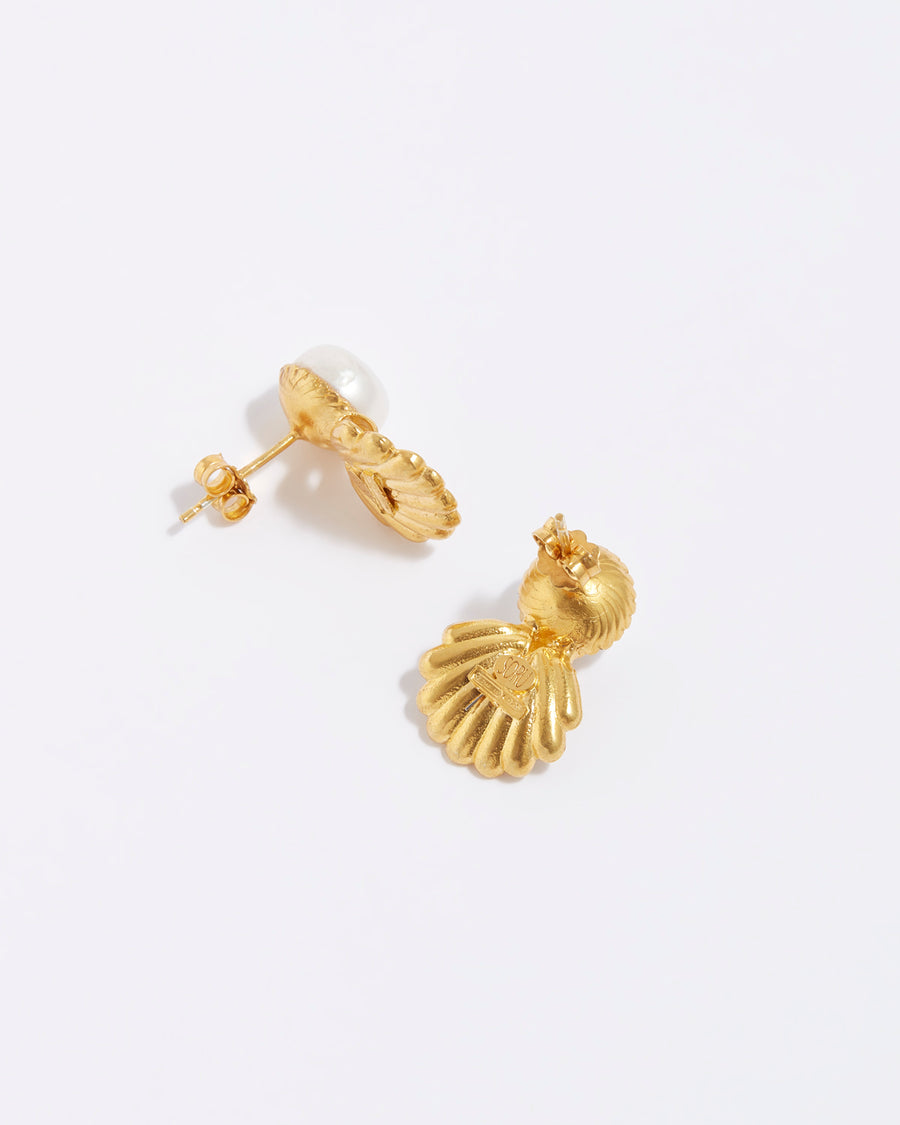 product shot of pearl stud earrings with crystal encrusted shell side view