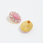Reverse and front Product shot of Soru Jewellery large pink stud earrings surrounded by crystals on a white background