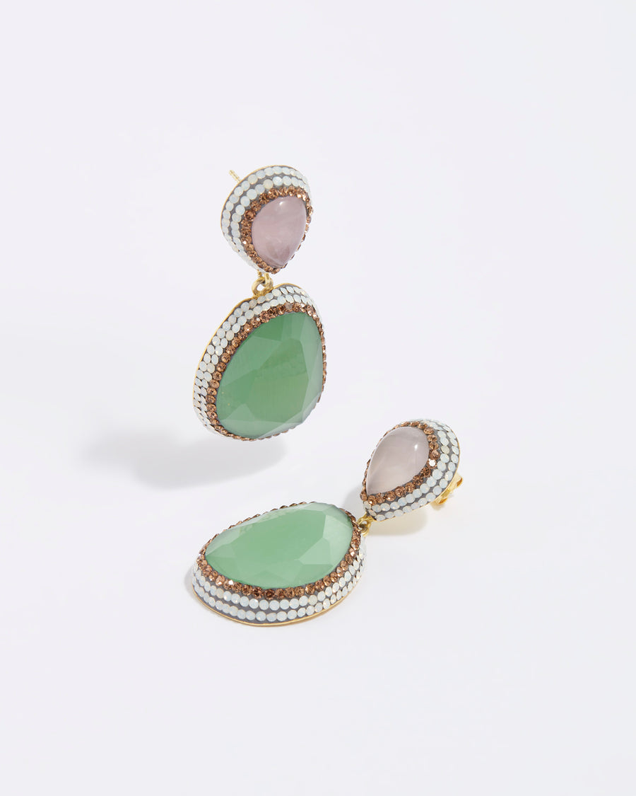 product shot of double drop pink rose quartz and green gemstone earrings surrounded by crystals