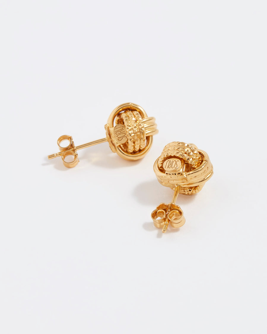 back of gold plated silver earrings textured link stud earrings with logo on the back