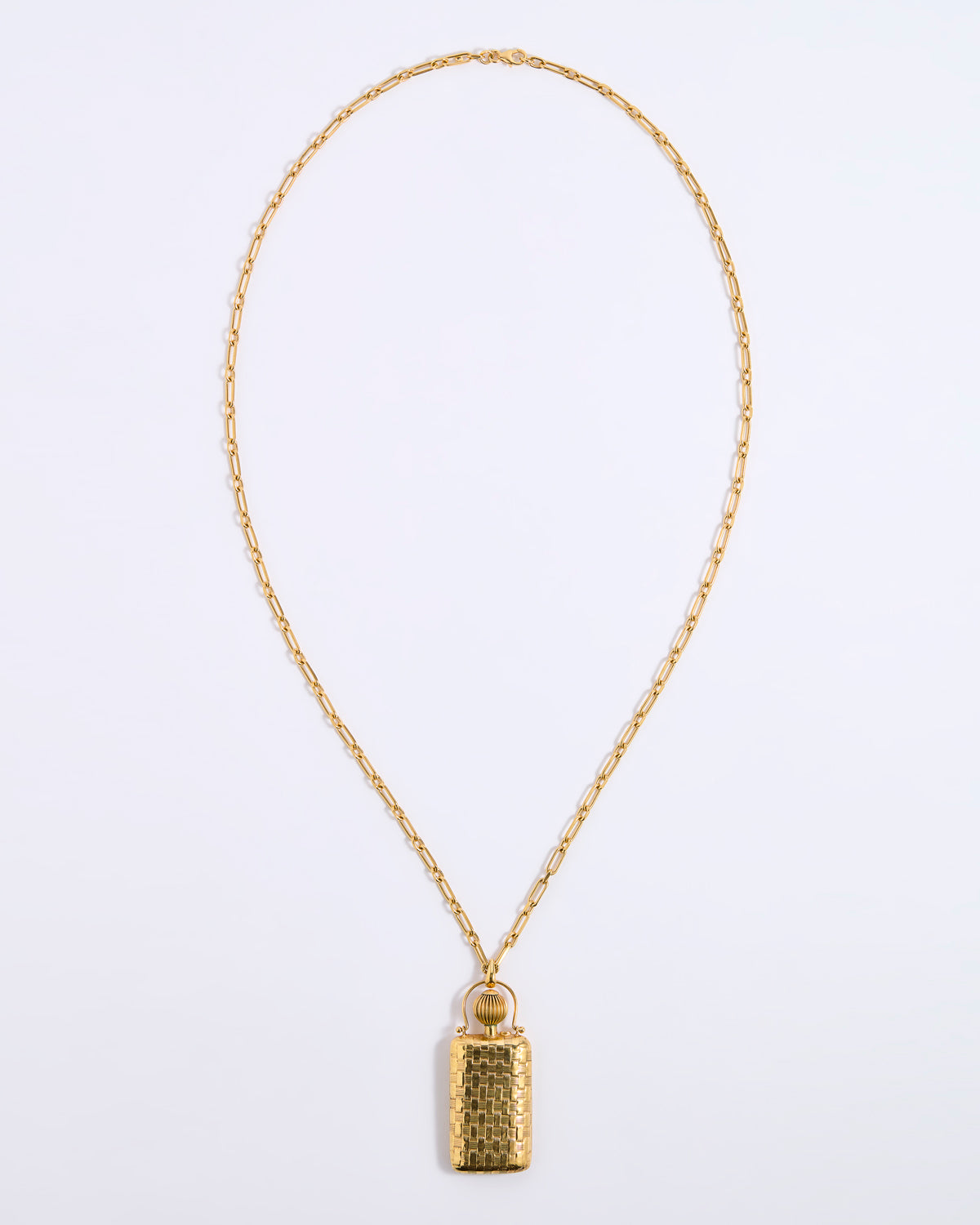 A gold chain necklace with a small rectangular pendant featuring a textured, hammered finish, displayed against a clean white background.