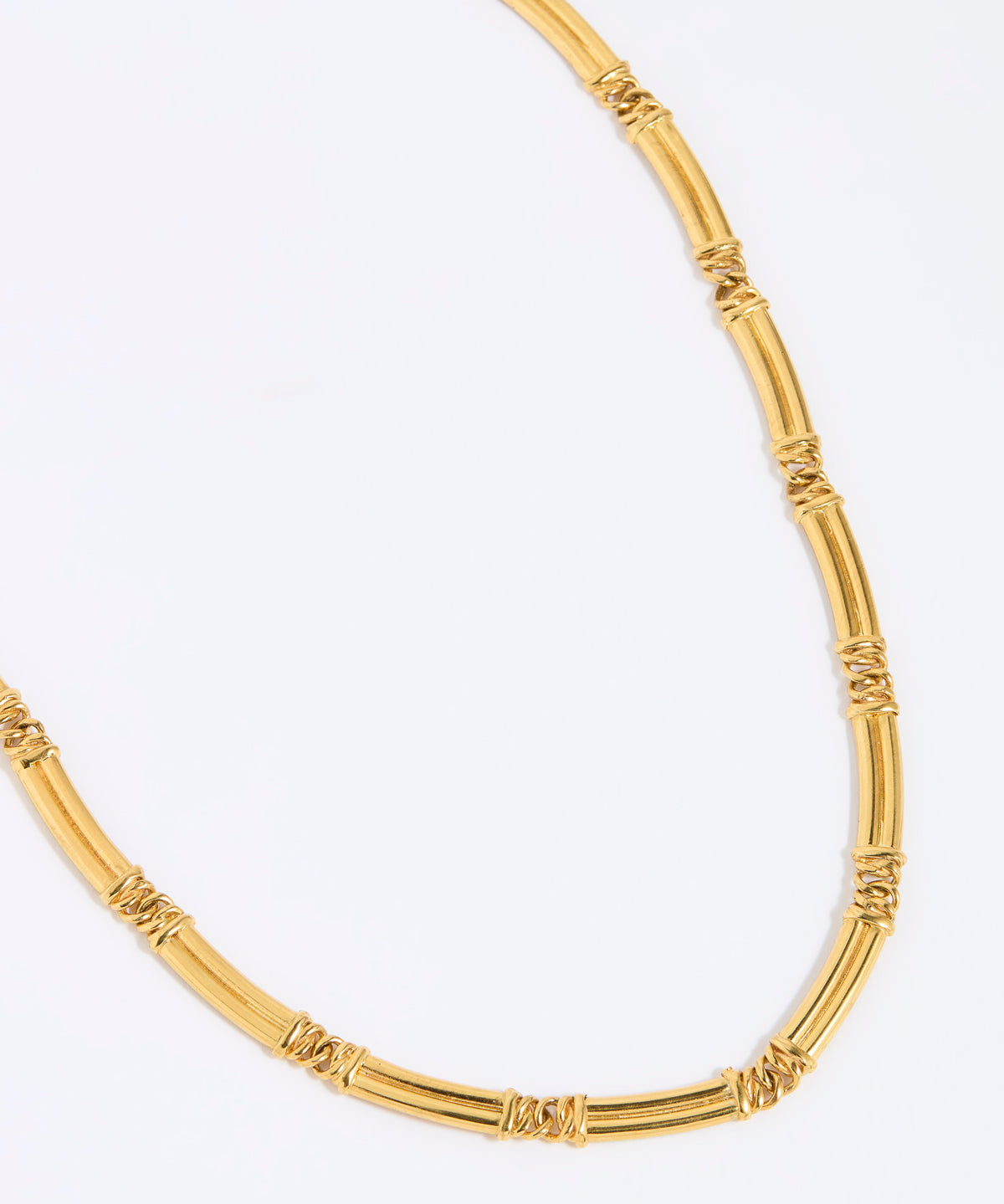 Gold chunky link necklace on a white background link 