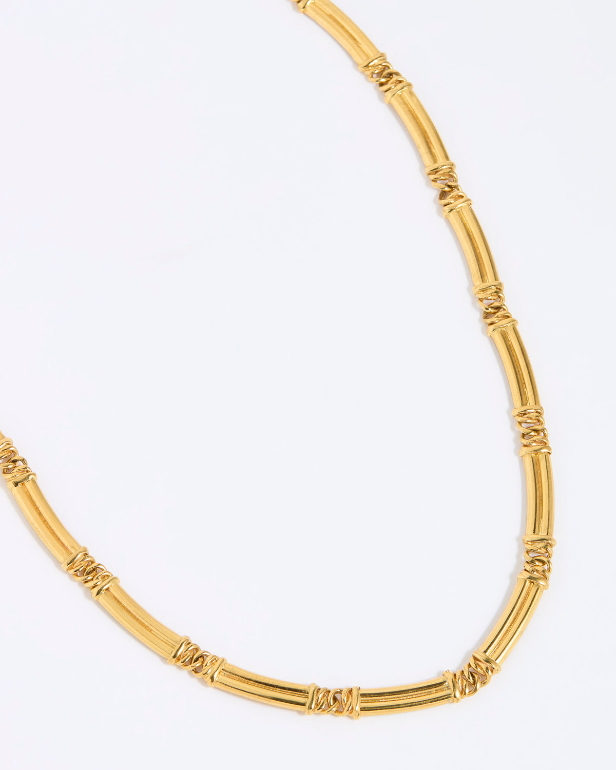 Gold chunky link necklace on a white background link 