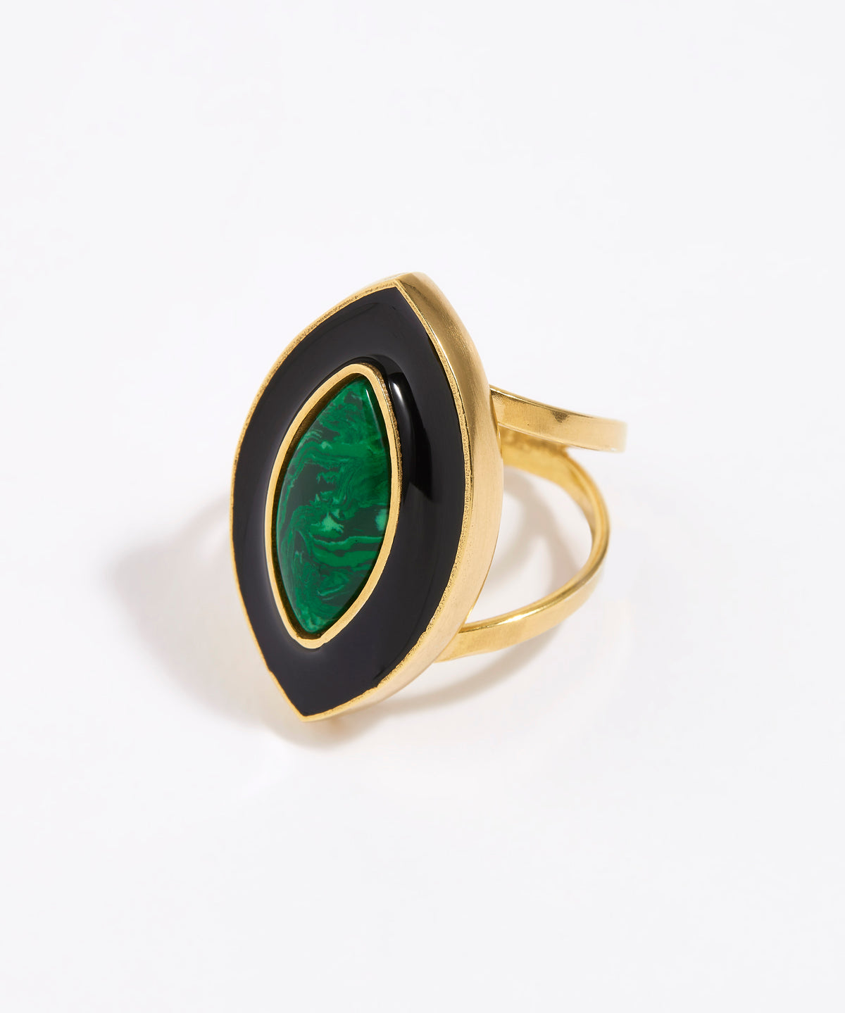 Gold ring with a green malachite gemstone and black enamel surround on a white background