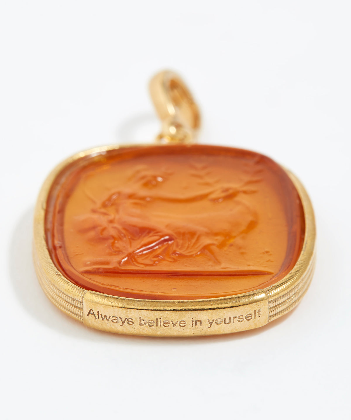 Gold pendant with a brown central design and 'Always believe in yourself' engraving on a white background