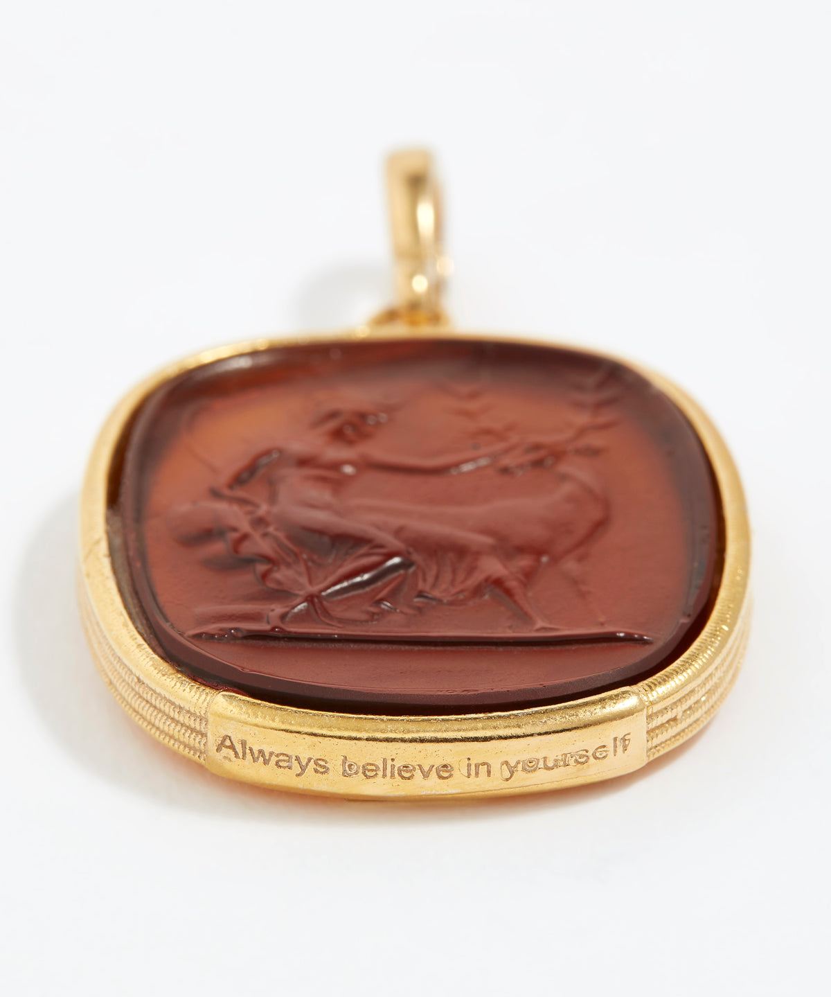 Gold pendant with a brown stone featuring an engraved design "always believe in yourself" on a white background.
