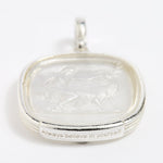 Close up of Large silver charm with near clear murano glass insert depicting the image of  Goddess Diana. With an inscription on the surround that says 'Always Believe in Yourself'