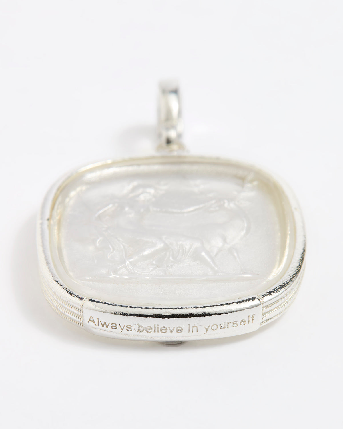 Close up of Large silver charm with near clear murano glass insert depicting the image of  Goddess Diana. With an inscription on the surround that says 'Always Believe in Yourself'