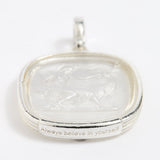 Close up of Large silver charm with near clear murano glass insert depicting the image of  Goddess Diana. With an inscription on the surround that says 'Always Believe in Yourself'