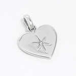 Silver Heart shaped charm with etched star and central clear crystal 