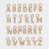 the alphabet of gold and diamond letter charms