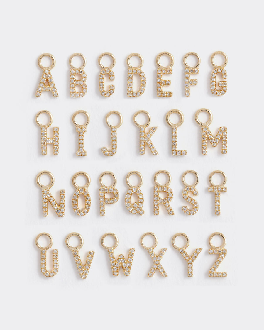 the alphabet of gold and diamond letter charms